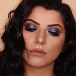 Burning Man - Limited Edition Palette -Beauty Bakerie Shop Klara Cosmetics Burning Man limited edition eyeshadow palette professional pigmented shades looks on the model three colorful shimmer matte glitter sparkle multichrome