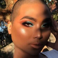 Burning Man - Limited Edition Palette -Beauty Bakerie Shop Klara Cosmetics Burning Man limited edition eyeshadow palette professional pigmented shades looks on the model two colorful shimmer matte glitter sparkle multichrome